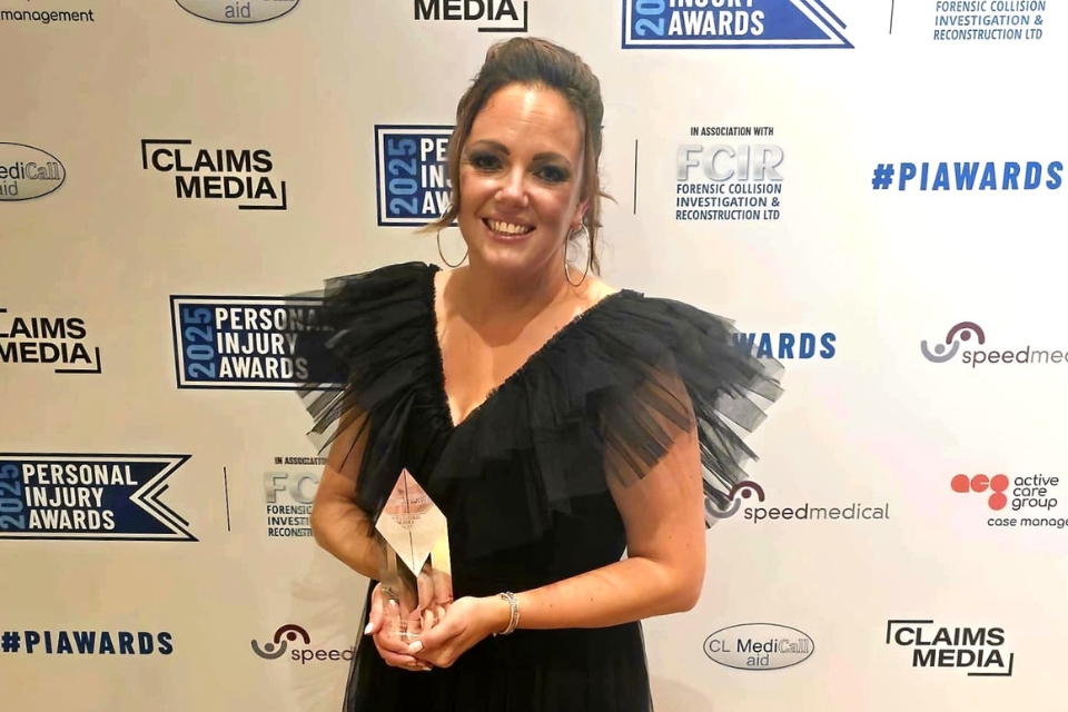 Rachel Pearce holds her award for winning Best Clinical Negligence Lawyer of the year at the Personal Injury Awards 2025
